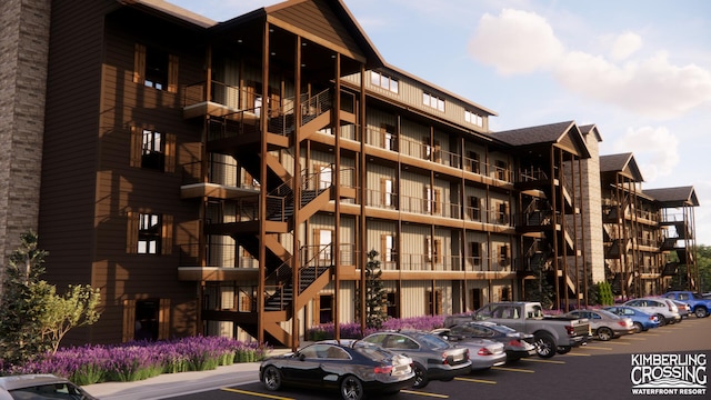 view of property with uncovered parking