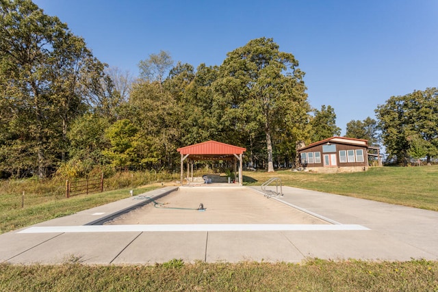 view of property's community with a lawn