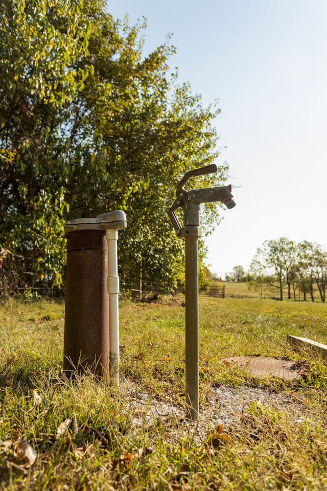 view of yard with a rural view