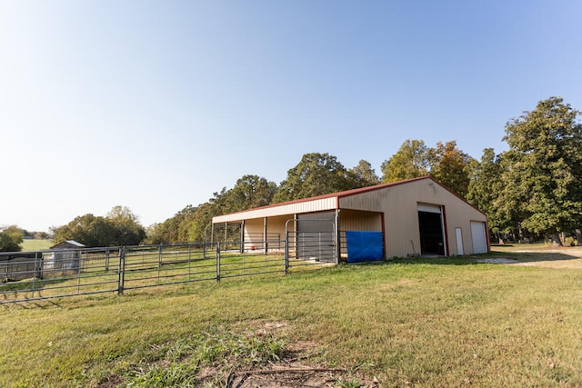 view of stable with a rural view