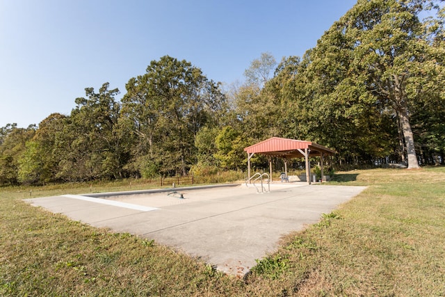 surrounding community featuring a gazebo and a lawn