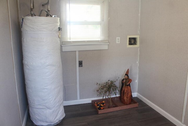 washroom featuring hookup for an electric dryer and dark hardwood / wood-style floors