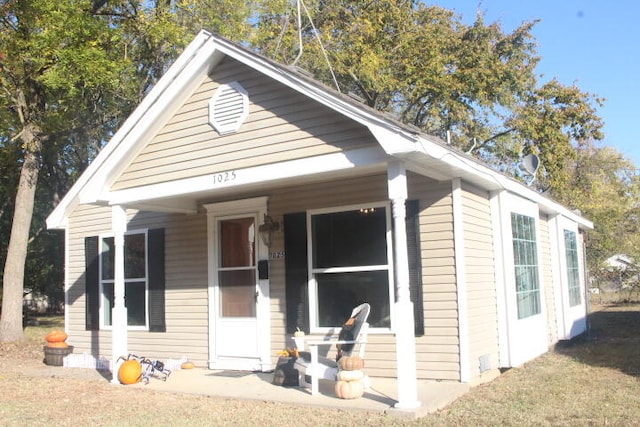 bungalow-style home with a porch