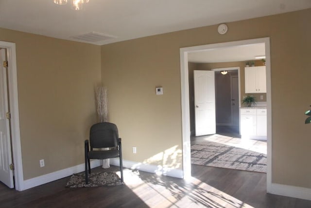 living area featuring dark hardwood / wood-style flooring