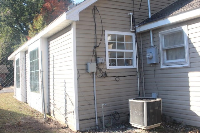 view of home's exterior with cooling unit