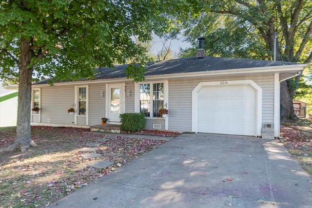 single story home with a garage