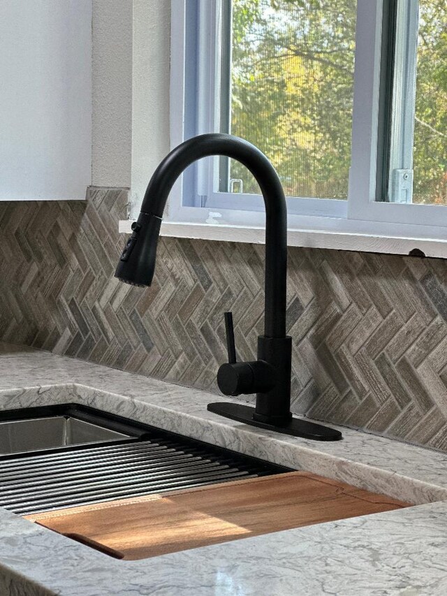 320 W N St, Mountain Grove, MO 65711 - detailed view of a wood stove and a sink