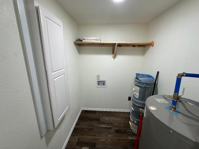 320 W N St, Mountain Grove, MO 65711 - clothes washing area with wood finished floors, baseboards, hookup for a washing machine, and water heater
