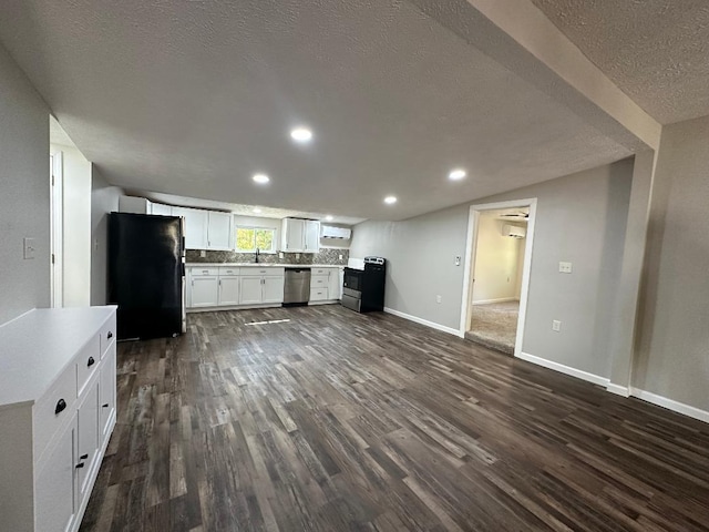 kitchen with black appliances, sink, a textured ceiling, white cabinetry, and dark hardwood / wood-style floors