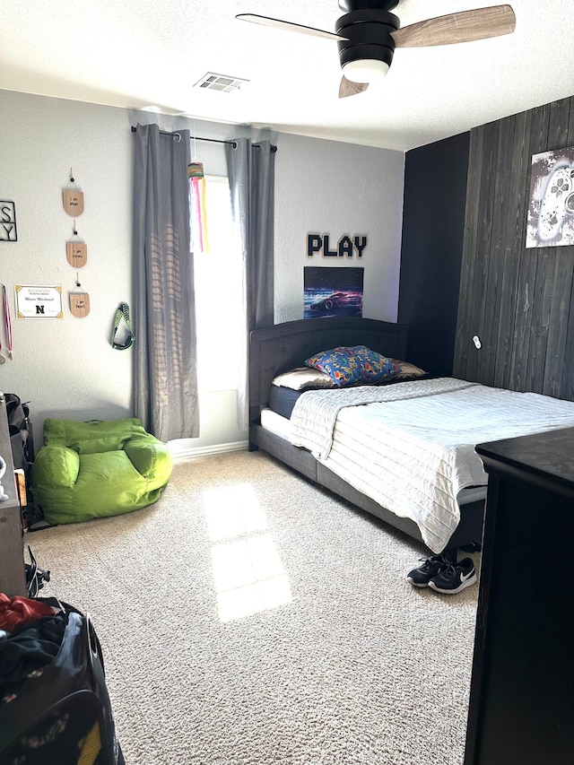 bedroom featuring carpet flooring and ceiling fan