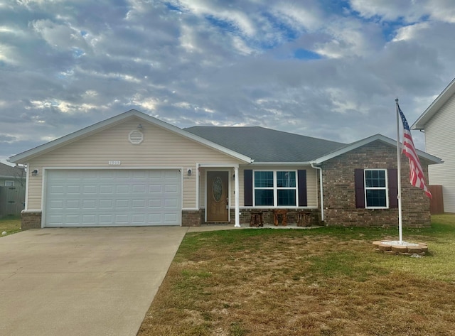 ranch-style house with a garage and a front lawn