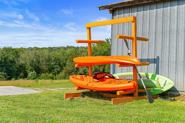 view of play area featuring a lawn