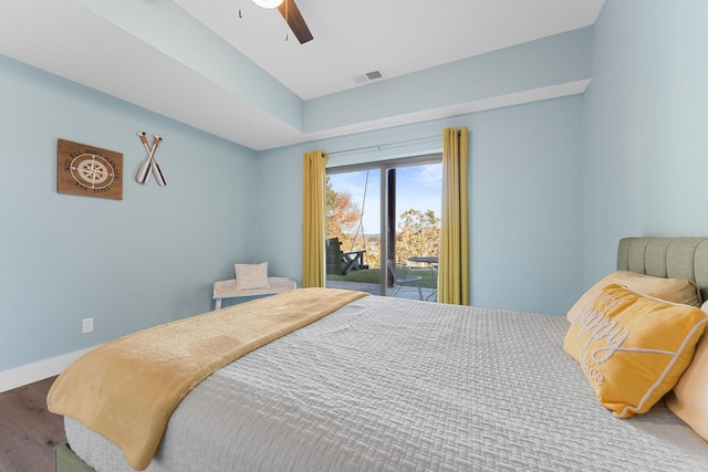 bedroom with visible vents, ceiling fan, baseboards, wood finished floors, and access to outside