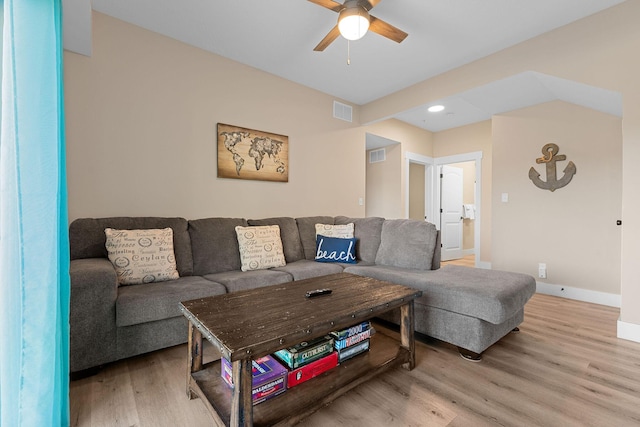 living area featuring visible vents, baseboards, light wood-type flooring, recessed lighting, and a ceiling fan
