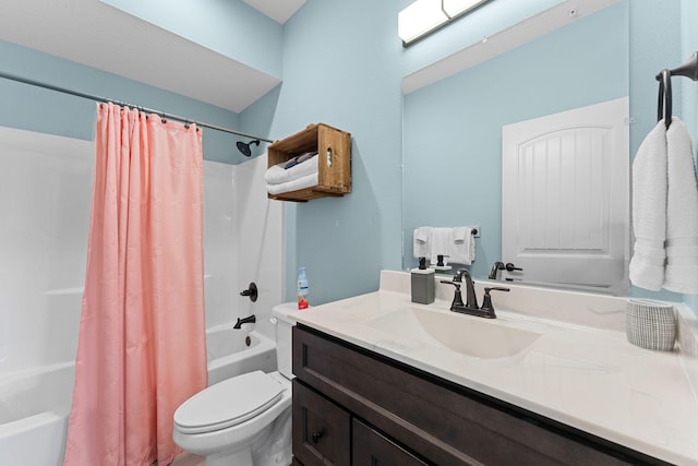 bathroom featuring shower / bathtub combination with curtain, vanity, and toilet