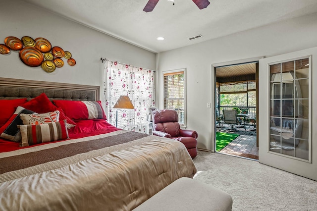 carpeted bedroom featuring access to outside and ceiling fan