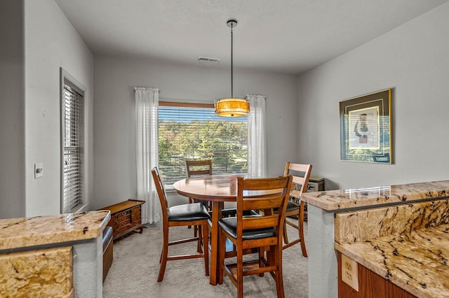 view of carpeted dining room