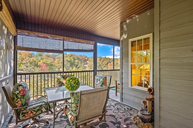 sunroom with wood ceiling