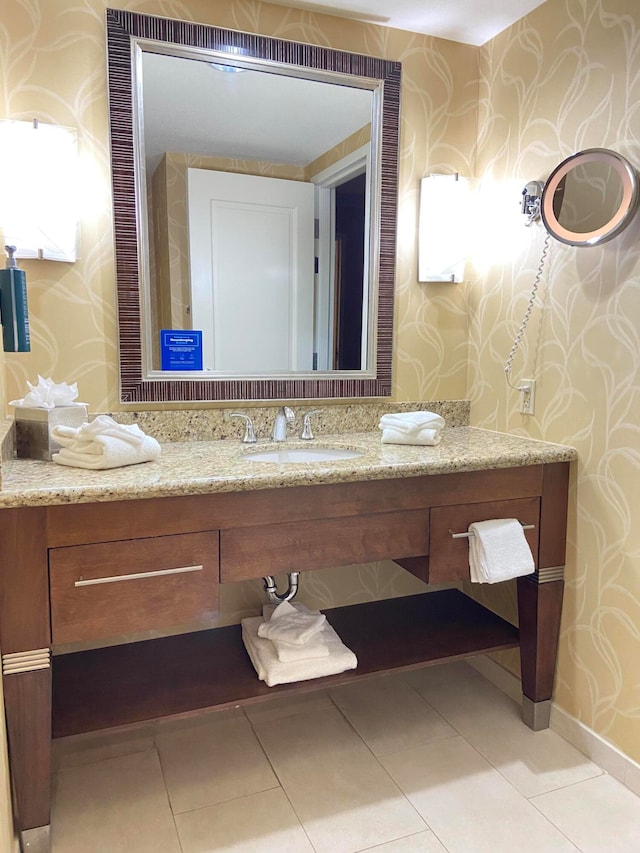 bathroom with vanity and tile patterned flooring