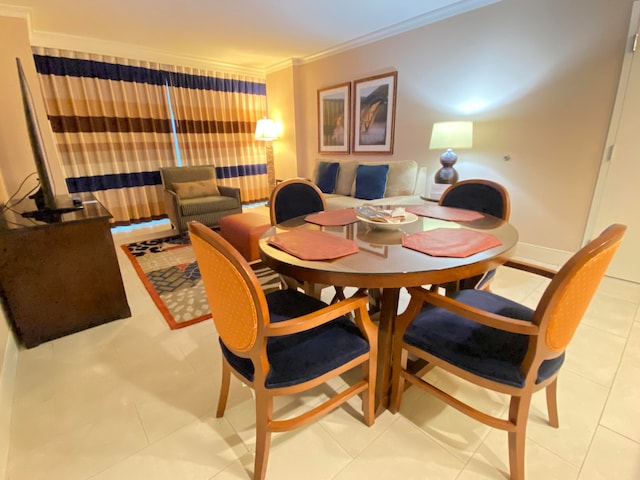 tiled dining area with ornamental molding