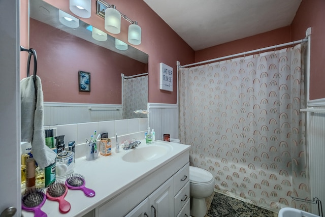 full bathroom featuring vanity, toilet, and shower / bath combination with curtain