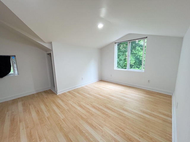1025 Woodland Ave, West Plains, MO 65775 - unfurnished room featuring vaulted ceiling, light wood-style flooring, and baseboards