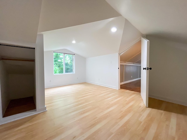 1025 Woodland Ave, West Plains, MO 65775 - bonus room with lofted ceiling, light wood-type flooring, and baseboards