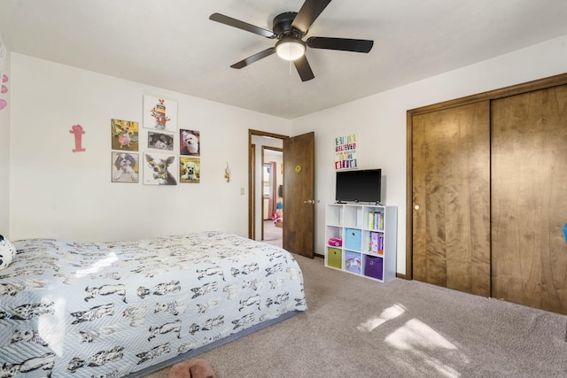 bedroom with a closet, ceiling fan, and carpet