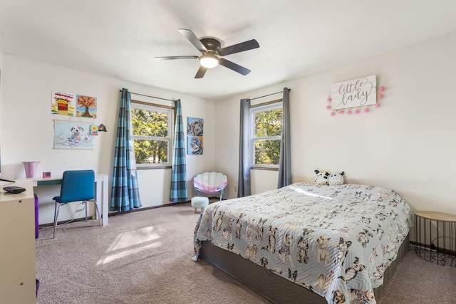 carpeted bedroom featuring ceiling fan