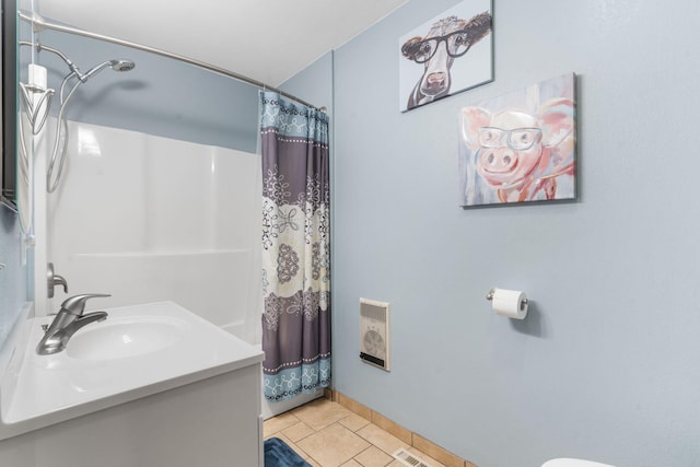 bathroom with vanity, tile patterned floors, and a shower with shower curtain