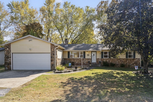 ranch-style home featuring a front yard and a garage