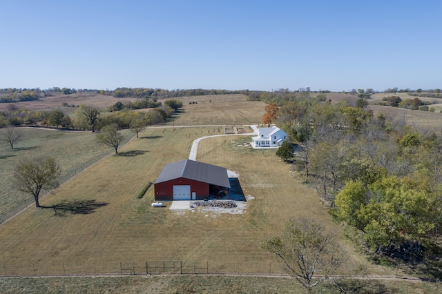 birds eye view of property featuring a rural view