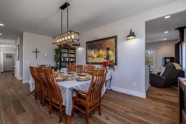 236 N Dade 147, Greenfield, MO 65661 - dining area with wood finished floors, baseboards, recessed lighting, and a chandelier