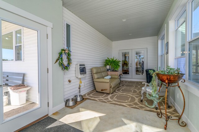 236 N Dade 147, Greenfield, MO 65661 - sunroom with french doors and heating unit