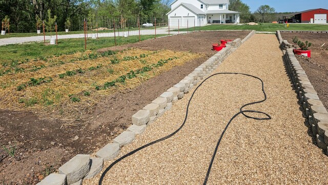 236 N Dade 147, Greenfield, MO 65661 - view of yard with a garage and driveway