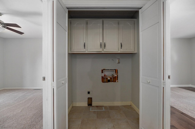 washroom featuring cabinets, washer hookup, light carpet, ceiling fan, and electric dryer hookup