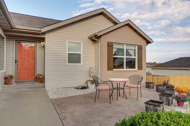 back of house with a patio