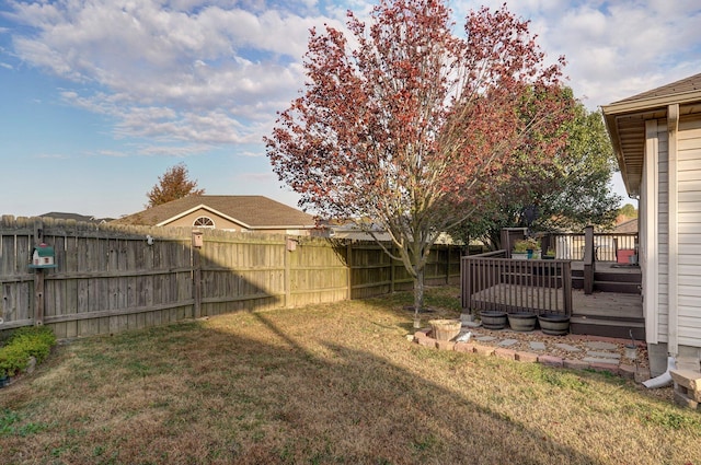 view of yard featuring a deck