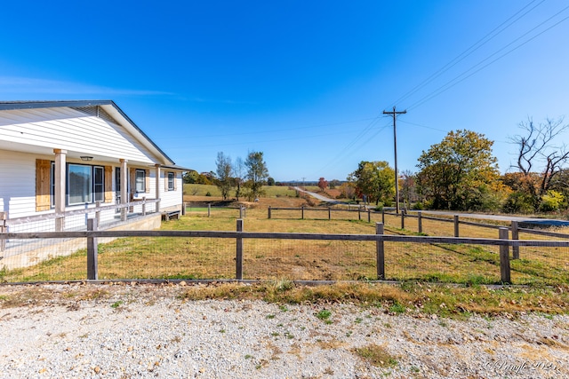 view of yard featuring a rural view