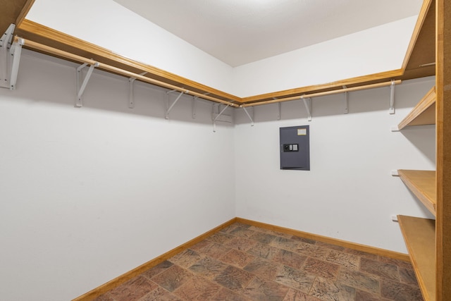 walk in closet featuring electric panel