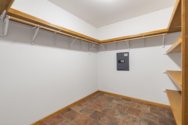55 Lovers Ln, Branson West, MO 65737 - walk in closet with stone finish flooring and electric panel