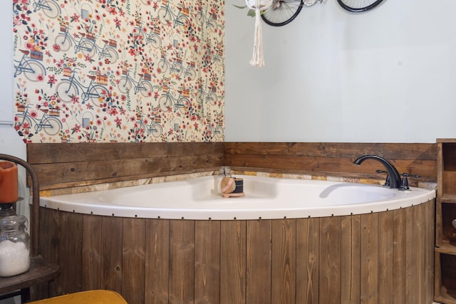 bathroom featuring a washtub