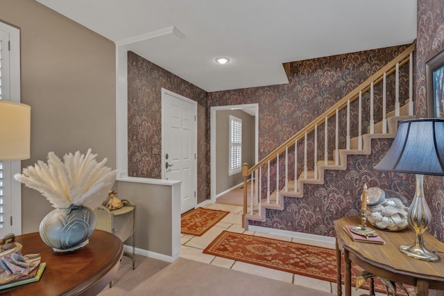 foyer with light tile patterned flooring