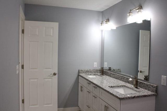 146 Mound St, Forsyth, MO 65653 - full bathroom featuring double vanity and a sink