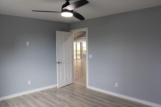 146 Mound St, Forsyth, MO 65653 - empty room with baseboards, a ceiling fan, and light wood-style floors