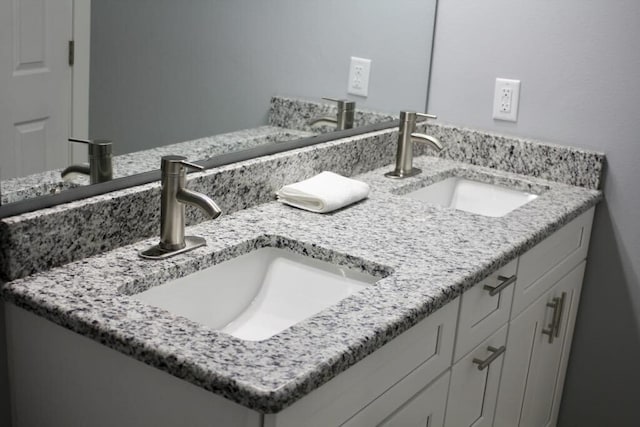 146 Mound St, Forsyth, MO 65653 - bathroom featuring double vanity and a sink