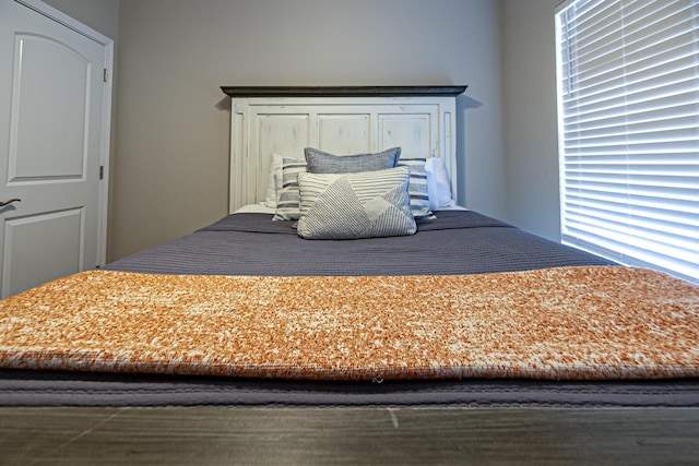 bedroom with multiple windows