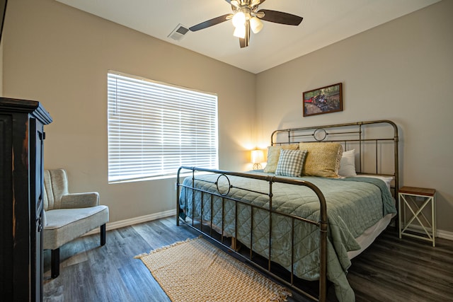 bedroom with ceiling fan and hardwood / wood-style floors