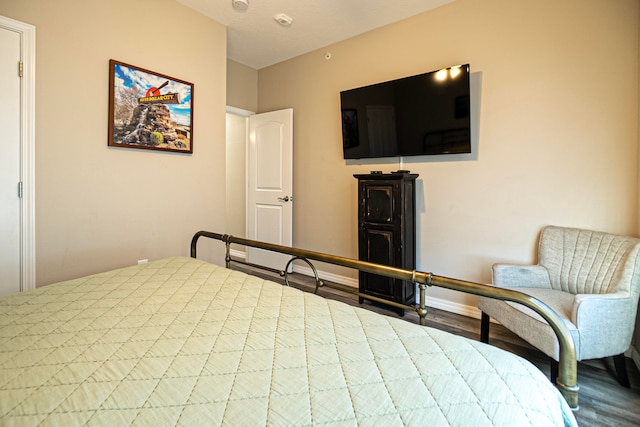 bedroom featuring hardwood / wood-style flooring