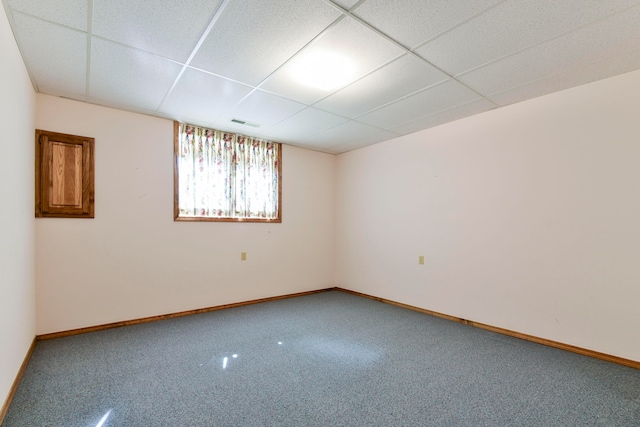 spare room with a drop ceiling